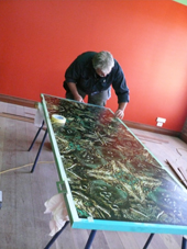attaching a sticker to a door panel